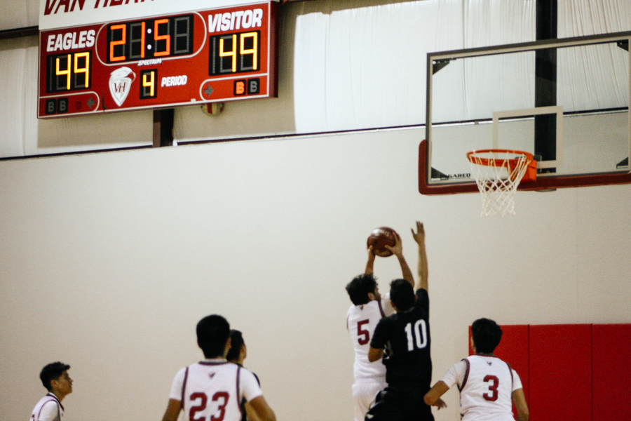 (Winning play) Alexis Flores drives in for the winning 2 point score in the last seconds of the title game against Ft. Hancock. -Photo by Pam Baugh