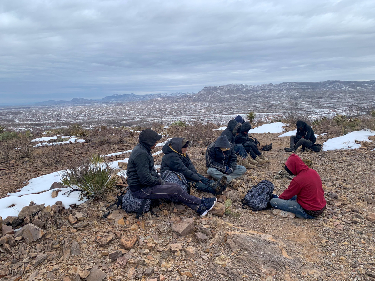 A group of migrants rescued by Border Patrol agents along the U.S.-Mexico border in Texas amid a winter storm that brought snow and freezing temperatures to the region. (Courtesy: U.S. Border Patrol)